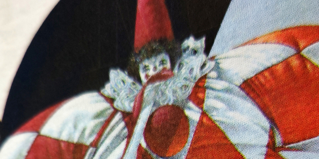 赤と白色のピエロの絵の拡大画像